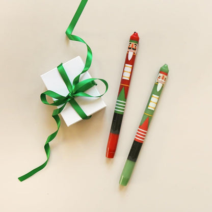 2 X Novelty Dinner Candles Traditional Nutcracker Design for Festive Christmas Decorations Unscented Secret Santa Table Décor Gift Burn Time 8 Hours Size 30Cm, Red